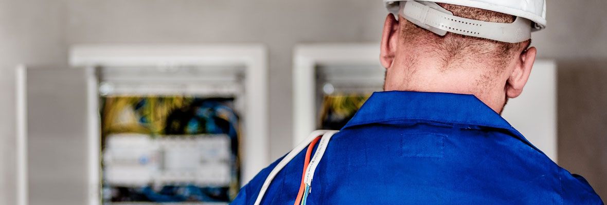 Electrician with Cables over Shoulder 1